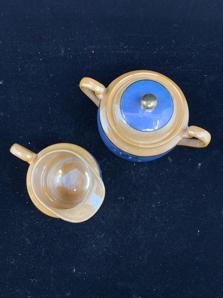 VTG BLUE AND ORANGE SUGAR AND CREAMER.