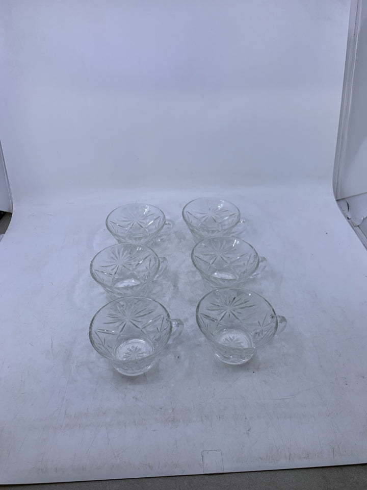 6 SHORT GLASS CUPS W/ STAR PATTERN.