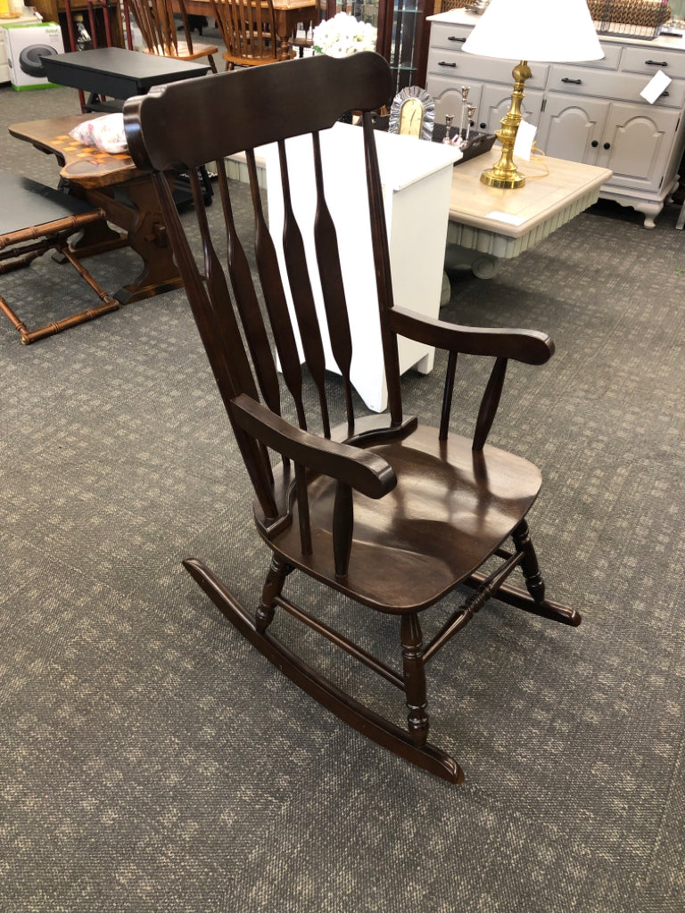 DARK WOOD ROCKING CHAIR.