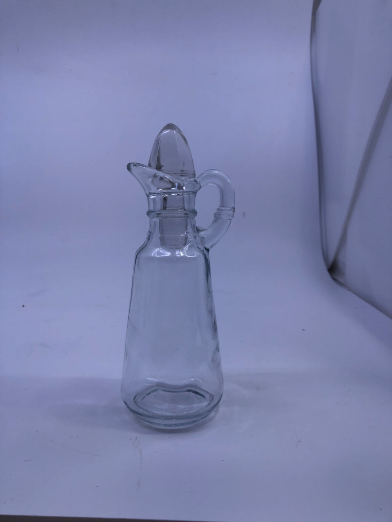 SMALL GLASS BOTTLE W STOPPER.
