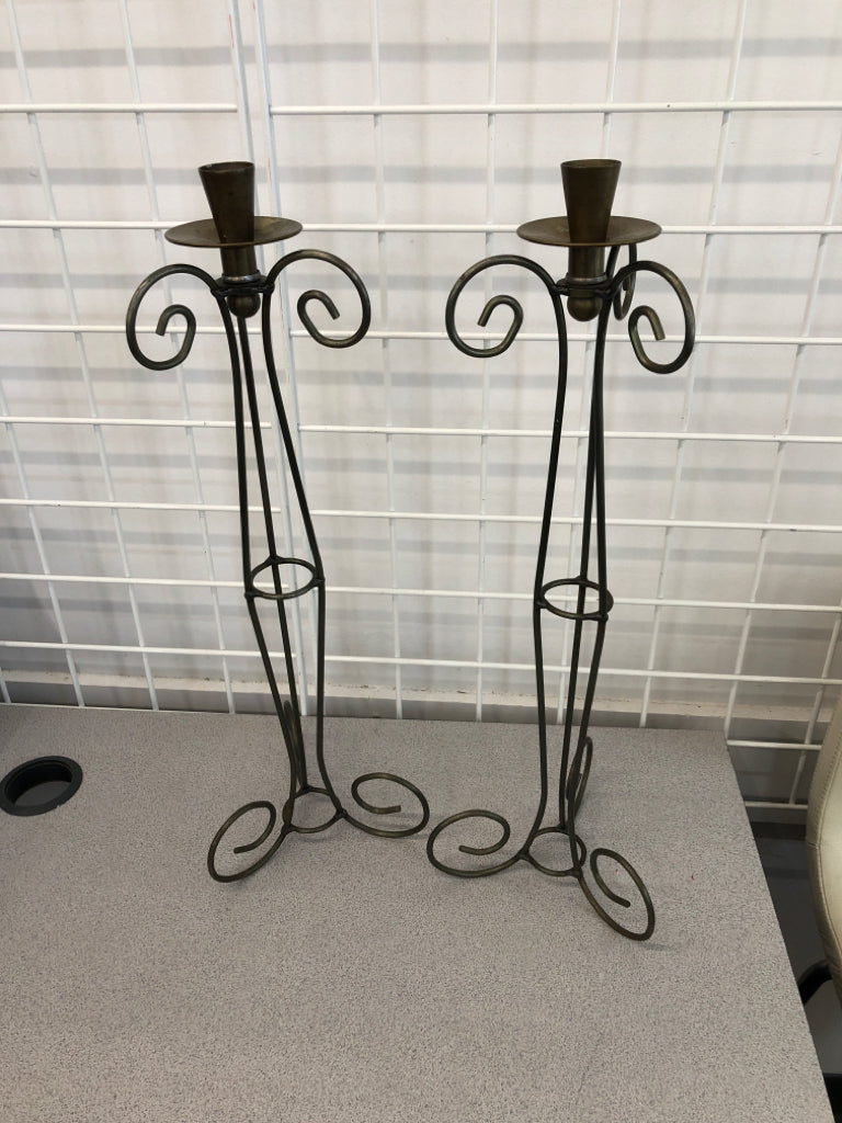 2 BRONZE SCROLL CANDLESTICK HOLDERS.
