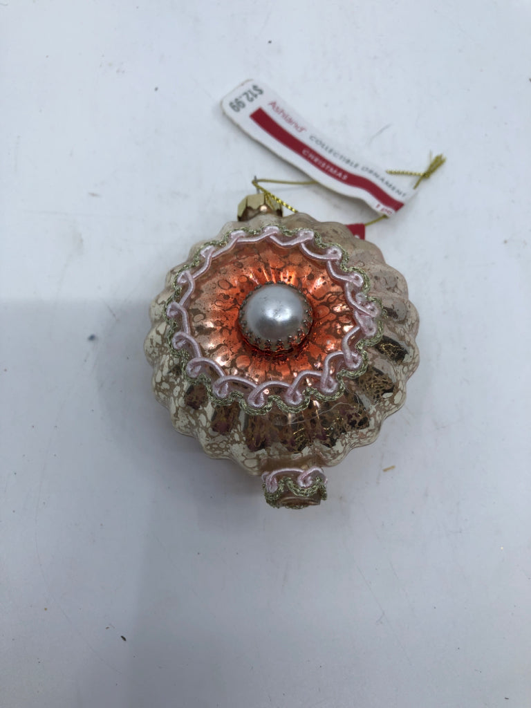 PEACH ROUND GLASS ORNAMENT.