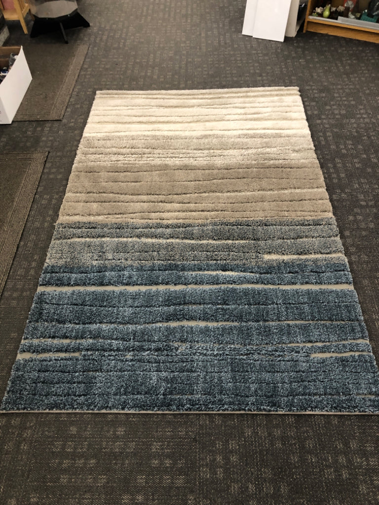 BLUE & CREAM OMBRE RUG.