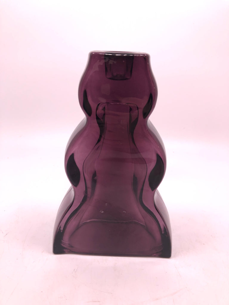 WAVY PURPLE GLASS CANDLE STICK HOLDER.