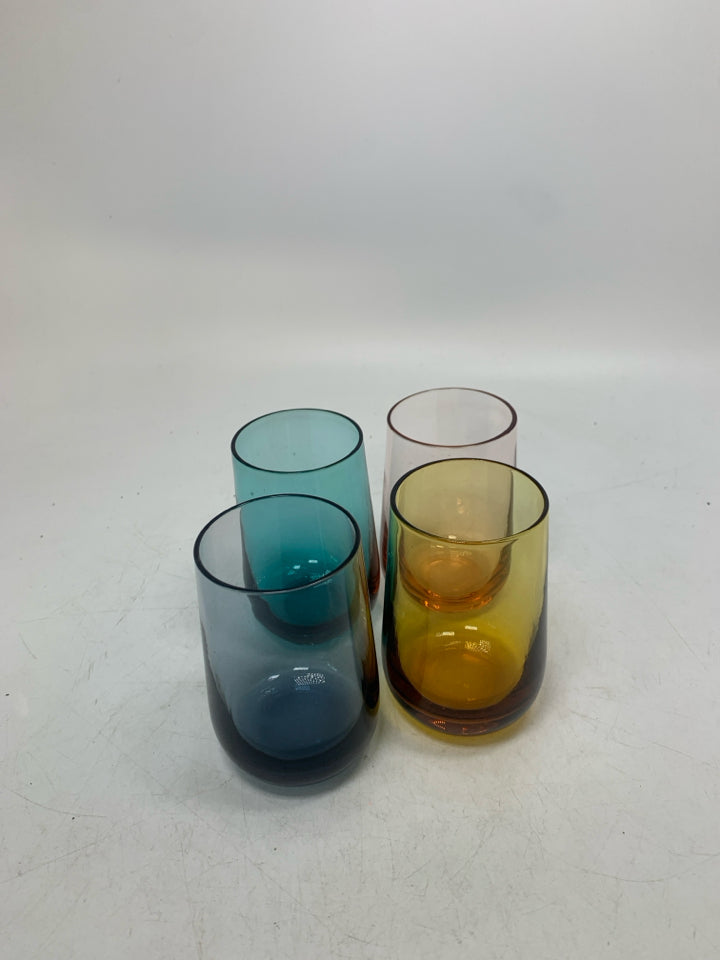 4 SHORT ASSORTED COLORS STEMLESS CORDIAL GLASSES.