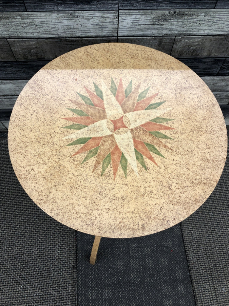 SMALL ROUND VTG TABLE W STAR PATTERN TOP.