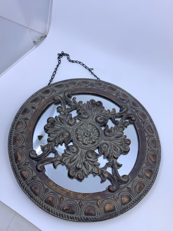 DARK WOOD CIRCLE SCROLL MIRROR IN BACK WALL ART.