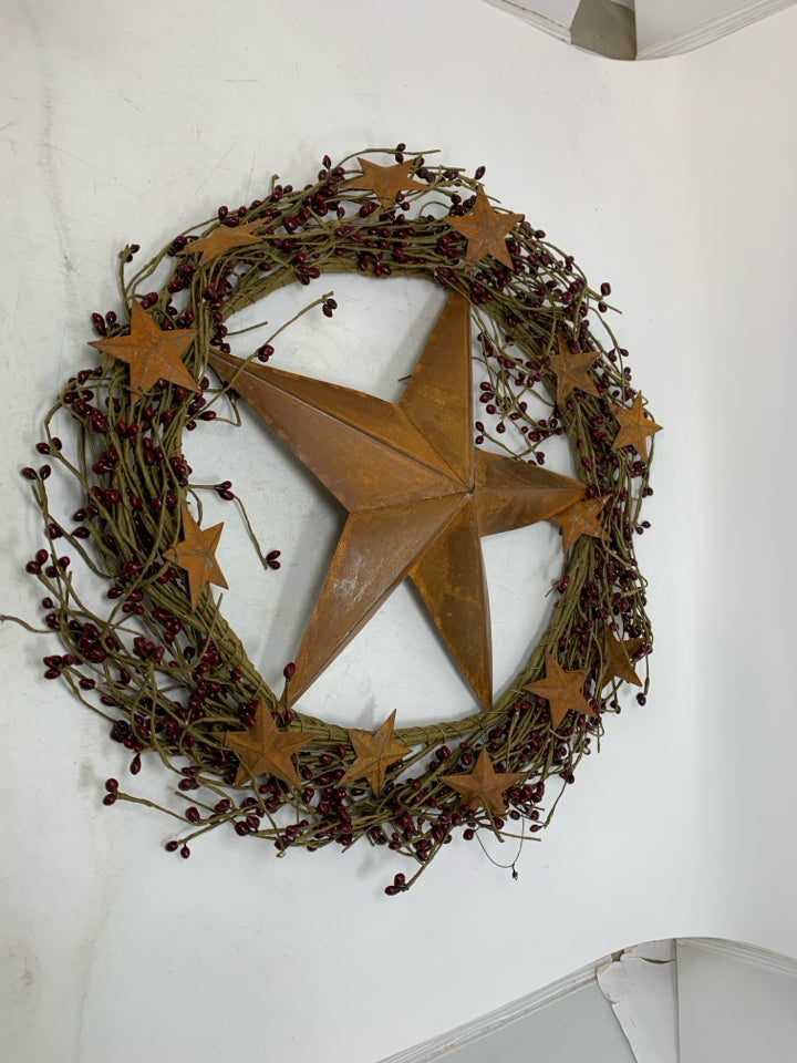 RUSTED STARS WREATH W/ PIP BERRIES.
