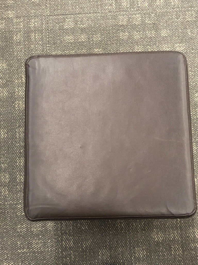 BROWN FAUX-LEATHER STORAGE CUBE.