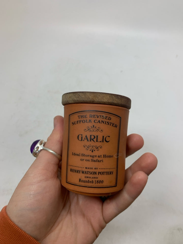 SMALL GARLIC CANISTER W/ WOOD TOP.