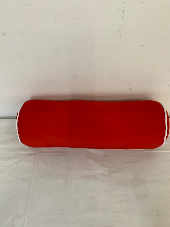 RED AND WHITE CYLINDER PILLOW.