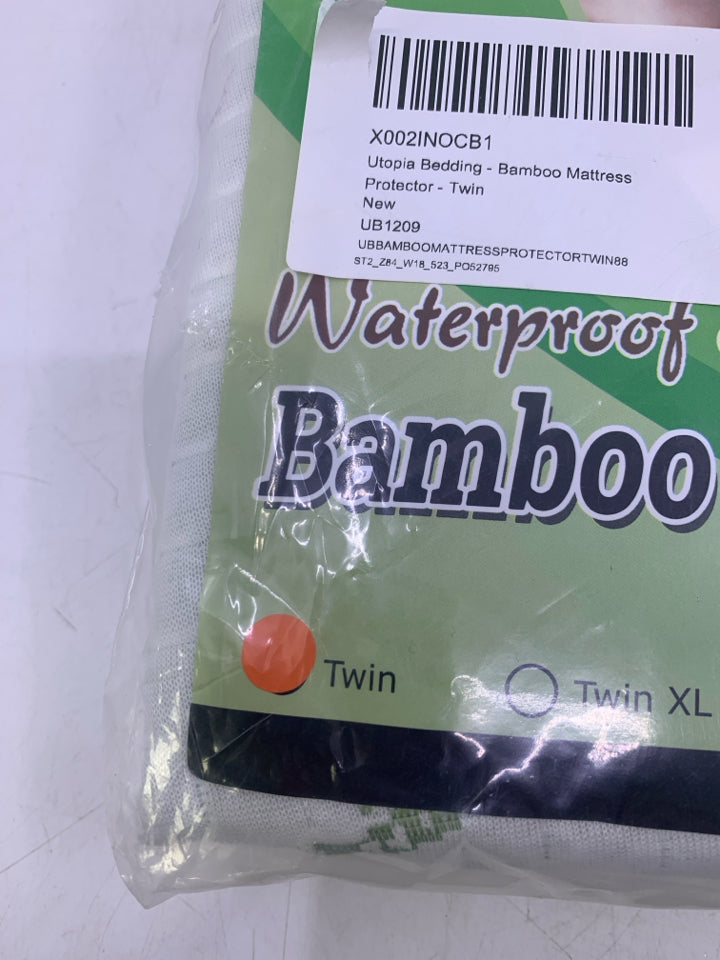 NIP BAMBOO MATTRESS PROTECTOR.