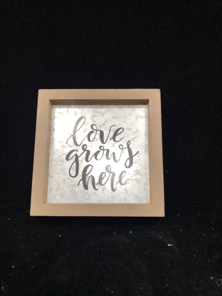 SMALL LOVE GROWS HERE GALVANIZED SIGN.