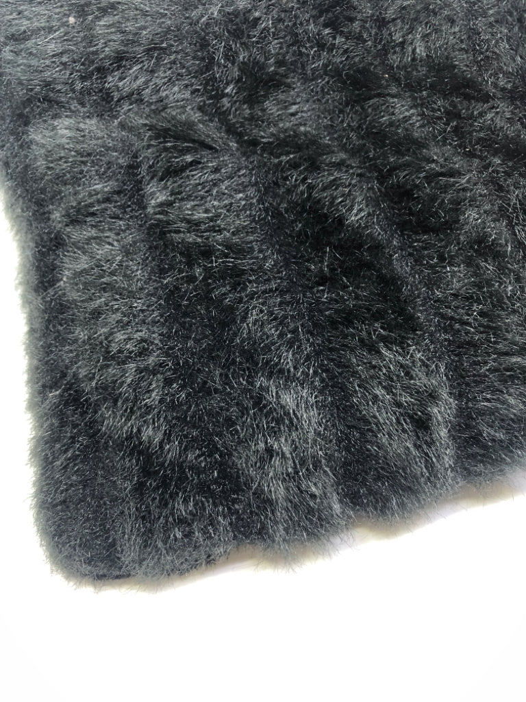 BLACK FUZZY PILLOW.