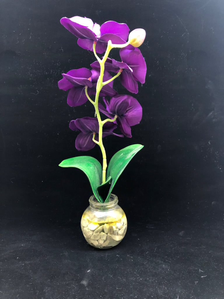FAUX PURPLE ORCHID IN GLASS PLANTER.
