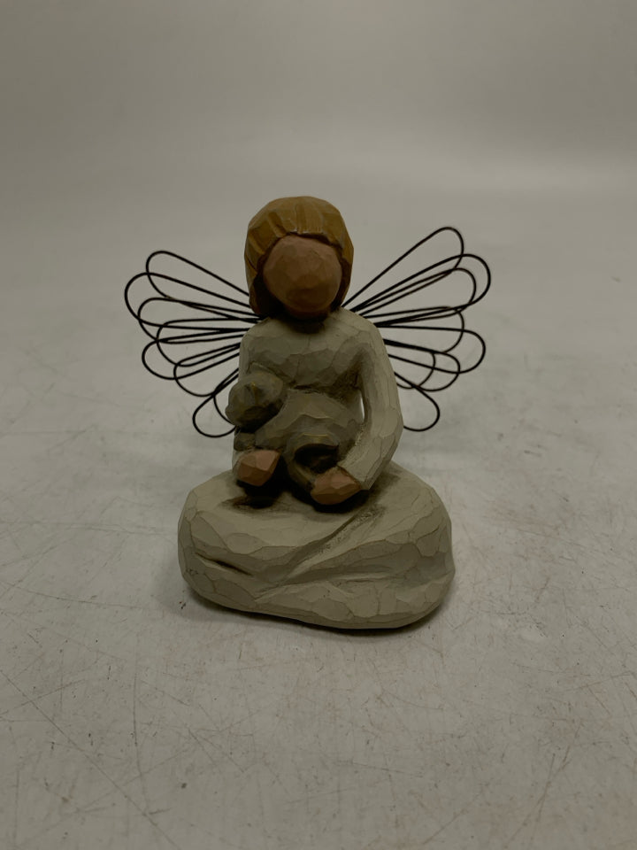SITTING ANGEL OF KINDNESS.
