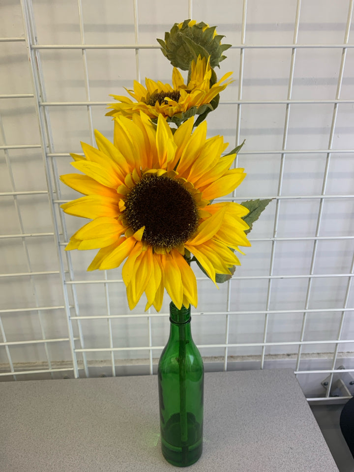 GREEN GLASS VASE W/ FAUX SUNFLOWERS.