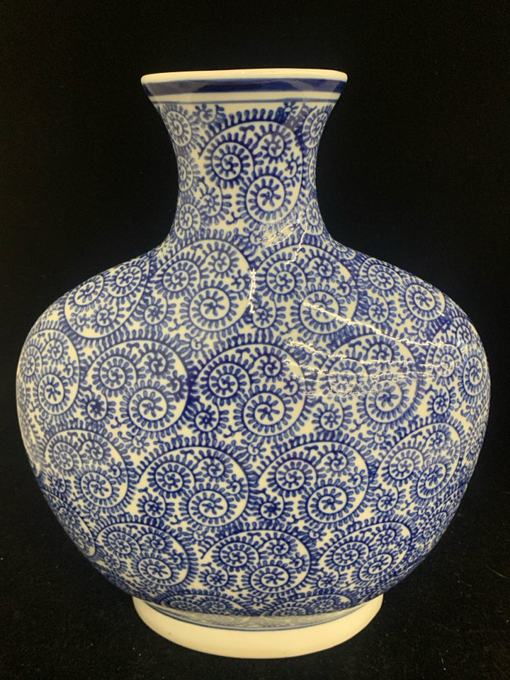 WIDE BASE BLUE AND WHITE VASE.