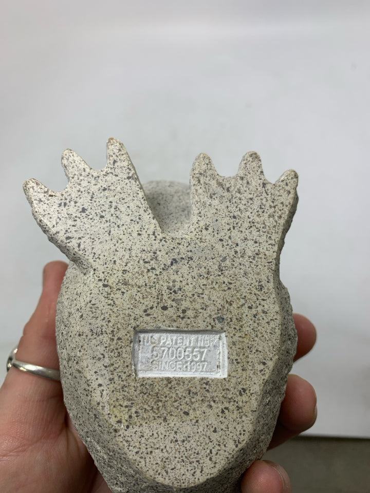 CEMENT DUCK W/ TEXTURED WING FEATHERS.