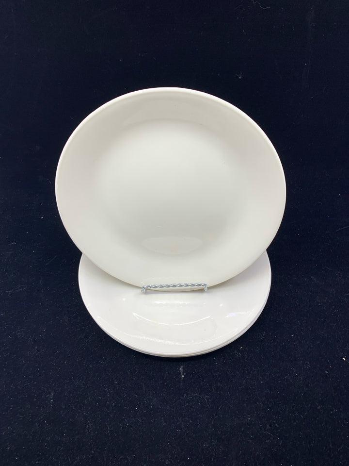 4 TAN CORELLE LUNCH PLATES.