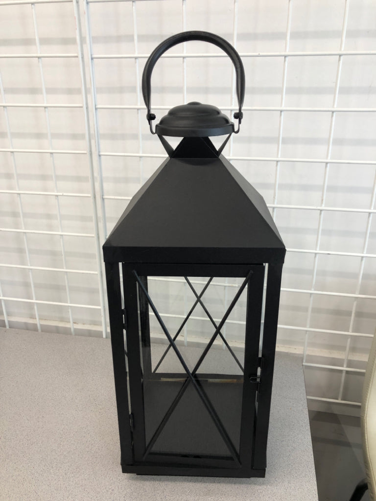 TALL BLACK CANDLE LANTERN.