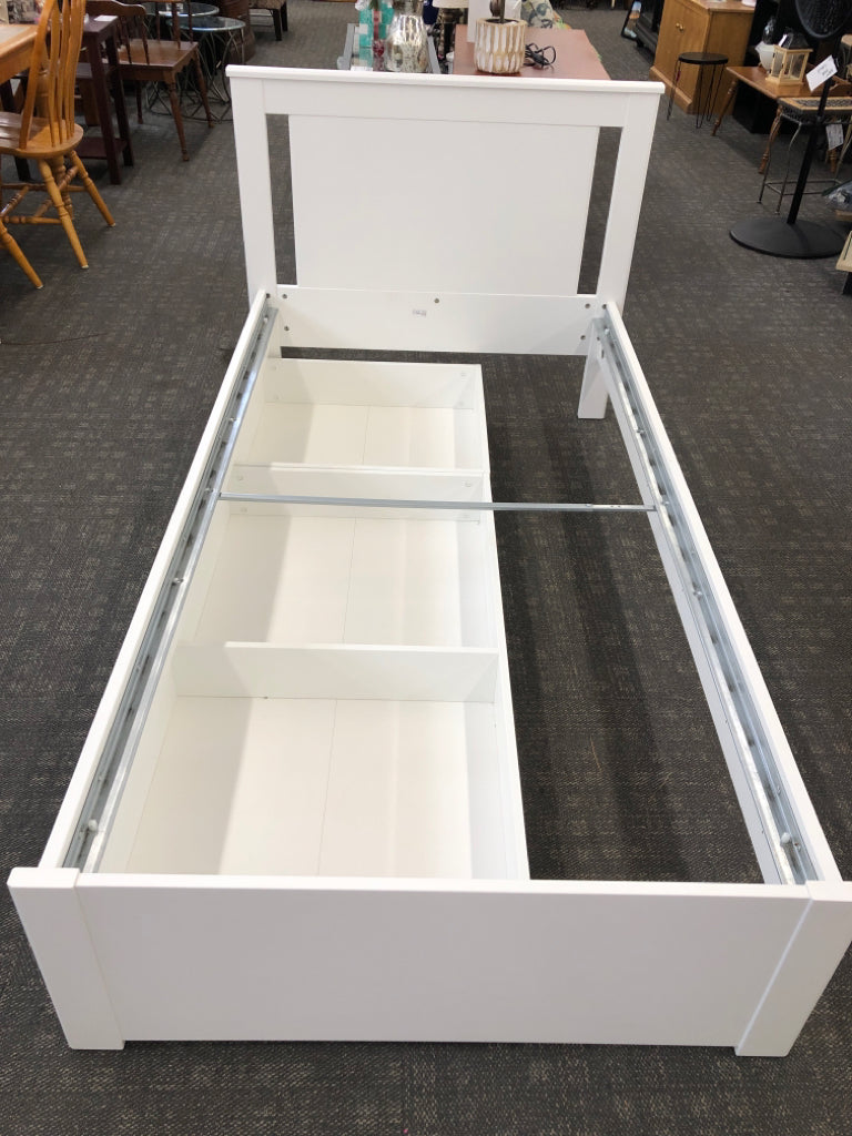 WHITE WOOD TWIN BED W/2 ROLLING DRAWERS.