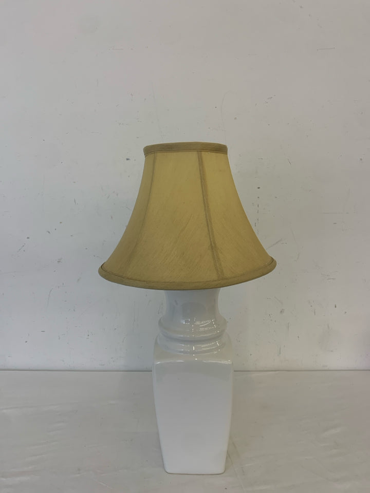 WHITE BASE LAMP W TAN SHADE.