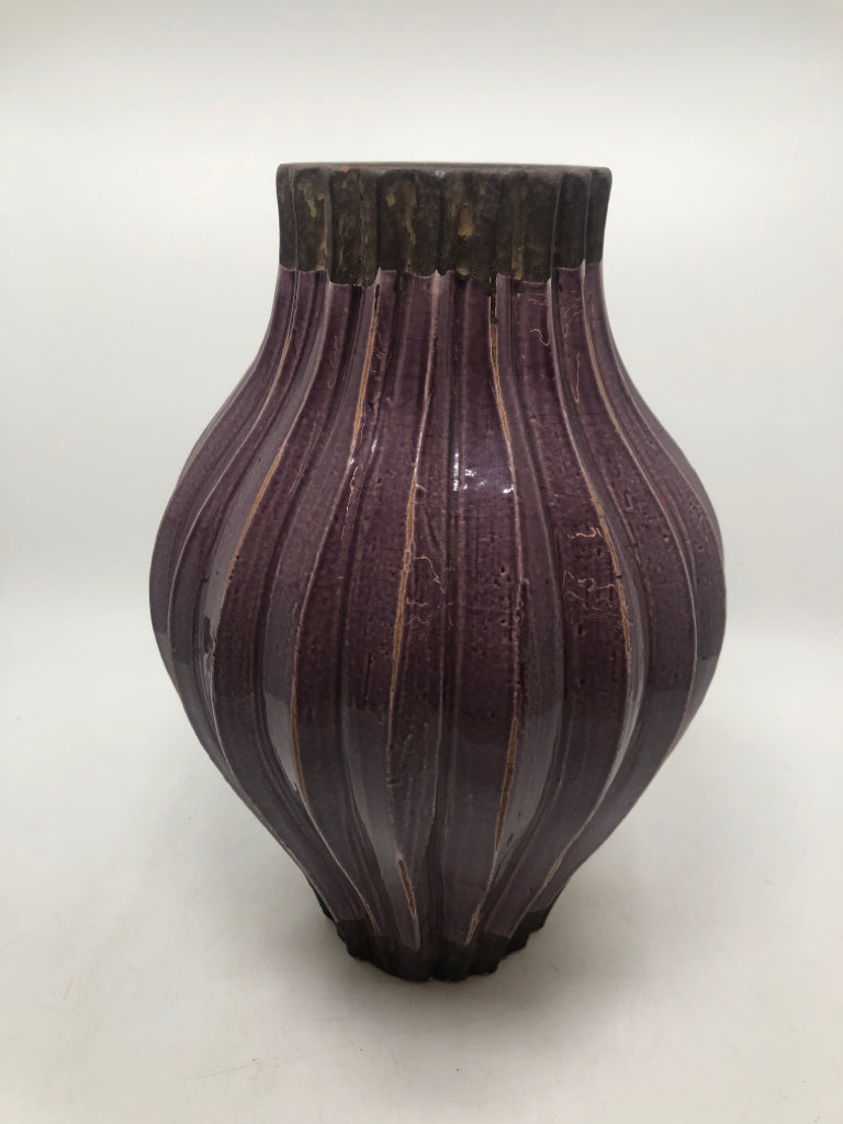 PURPLE RIBBED HEAVY POTTERY VASE.