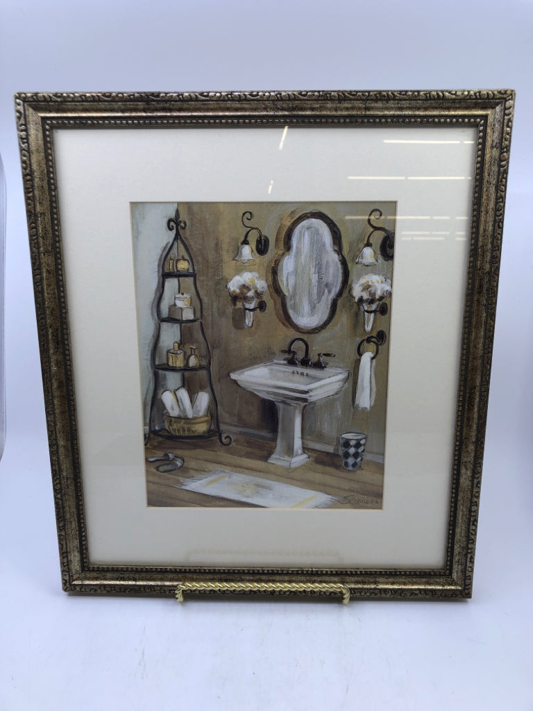 BATHROOM SINK W ORNATE SILVER FRAME.
