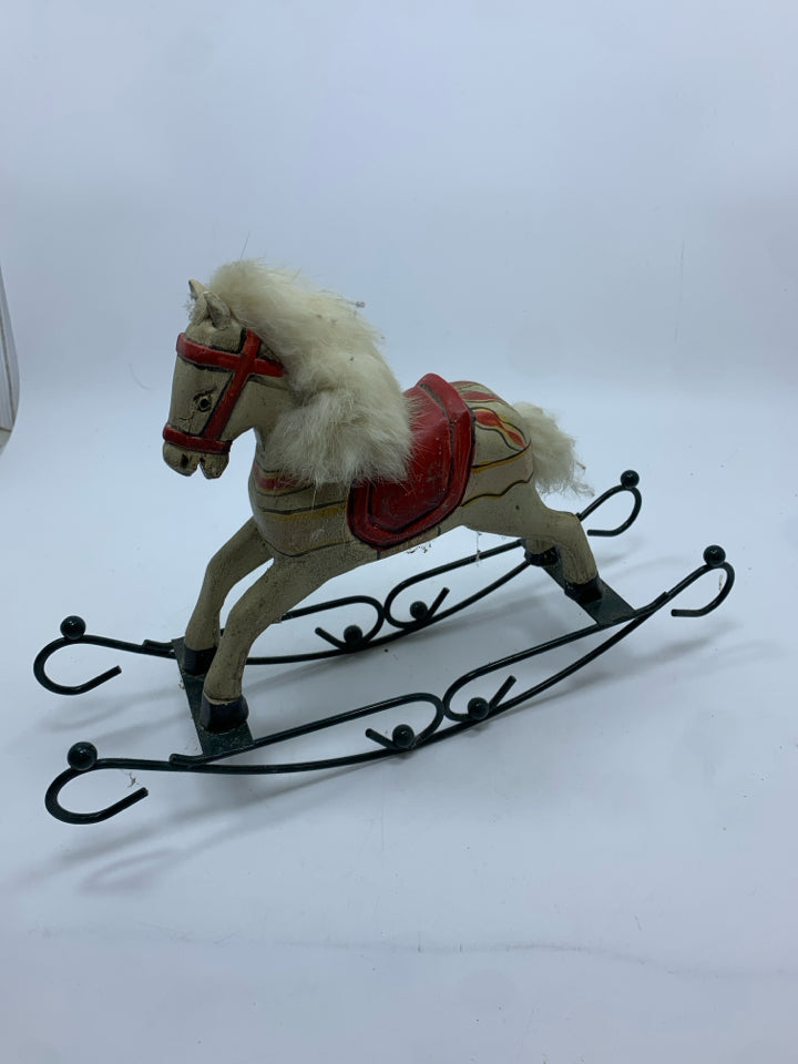 VTG WOODEN ROCKING HORSE W/GREEN METAL BASE.