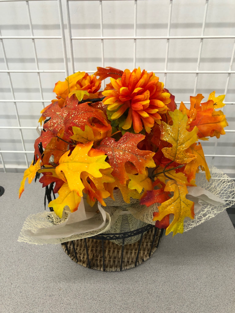 GLITTER LEAF BOUQUET IN WIRE BASKET.