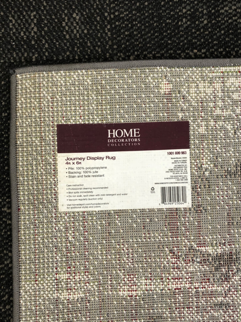 HOME DECORATORS JOURNEY DISPLAY RUG.