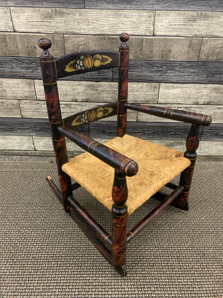 VTG SMALL CHILDS ROCKING CHAIR W WICKER BOTTOM.