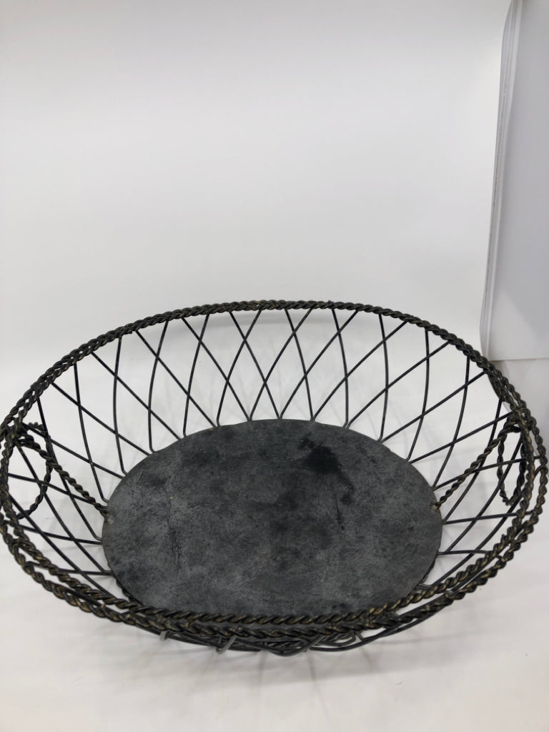 DISTRESSED METAL OVAL BASKET W HANDLES.