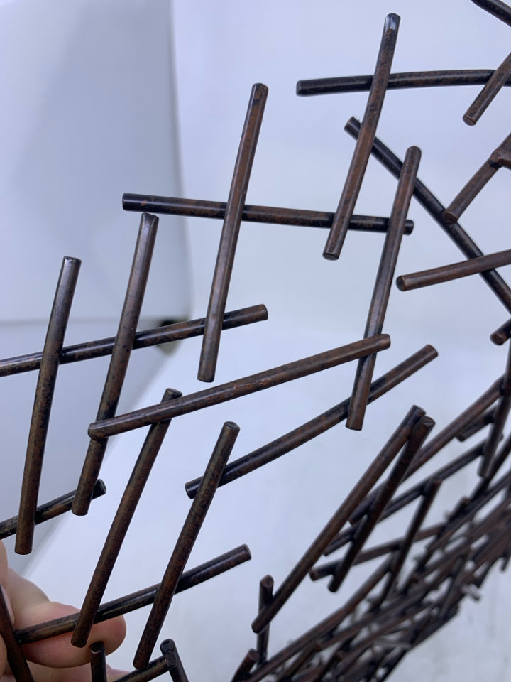 SHALLOW BROWN METAL STICK CIRCLE BASKET.