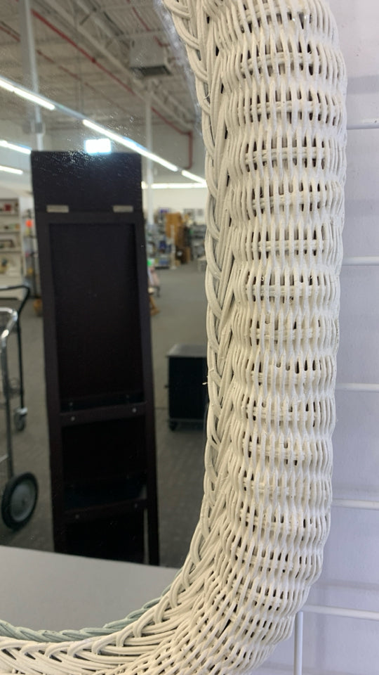 WHITE WICKER OVAL WALL MIRROR.