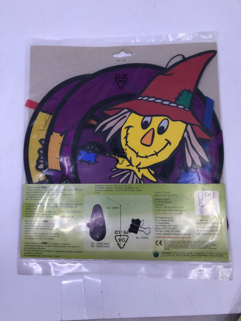NIP SCARECROW SPIRAL WIND SPINNER.