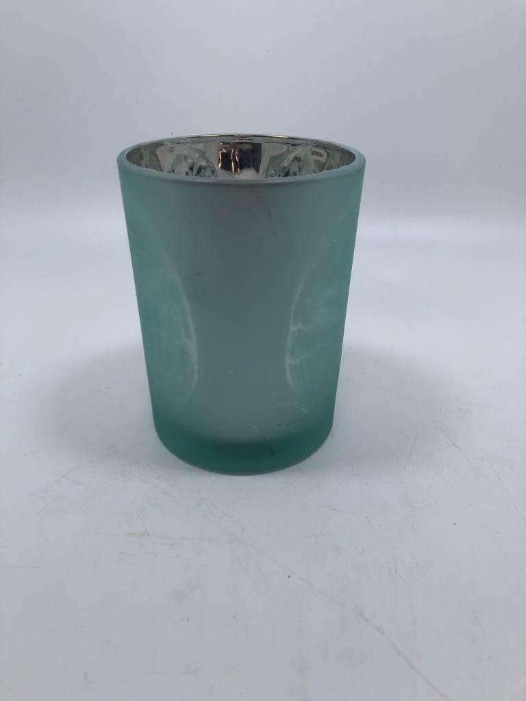 FROSTED SAND DOLLAR TEA LIGHT HOLDER.
