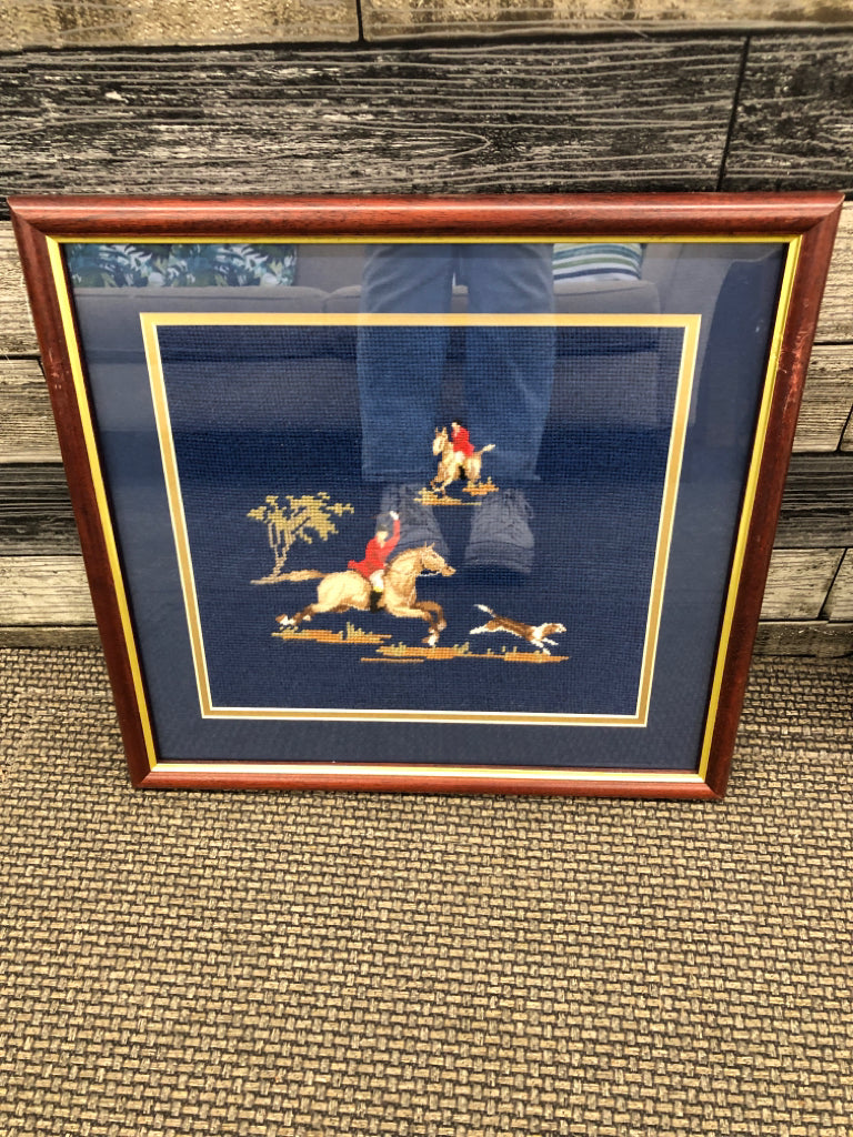 FRAMED NEEDLEPOINT JOCKEY PICTURE IN WOOD FRAME.