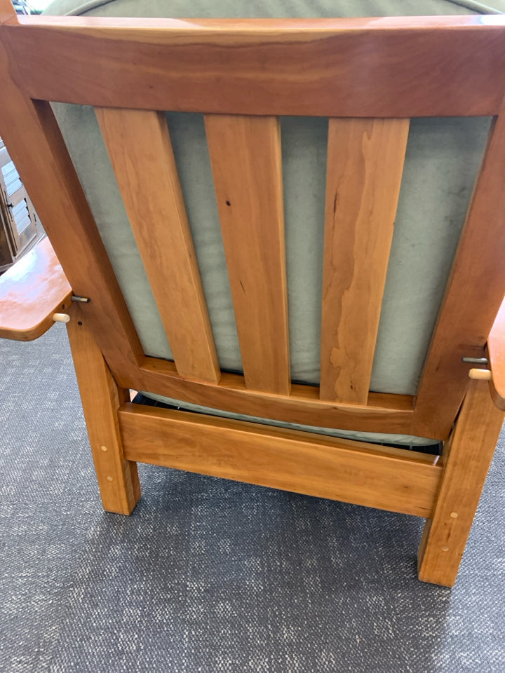 OAK WOOD W/ GREEN CUSHION CHAIR W/ OTTOMAN.