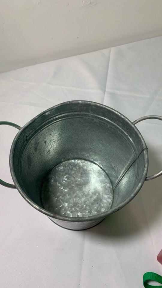 NORTH POLE GALVANIZED BUCKET W HANDLES.