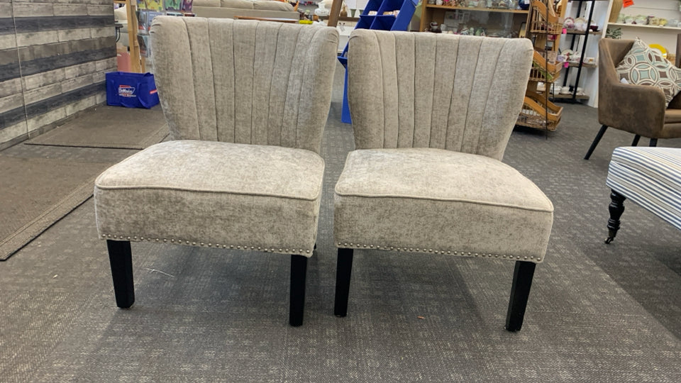 2 UPHOLSTERED GRAY CHAIRS W/NAILHEAD DETAIL.