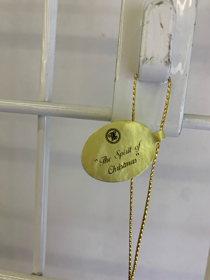 CERAMIC SPIRIT OF CHRISTMAS ORNAMENT.