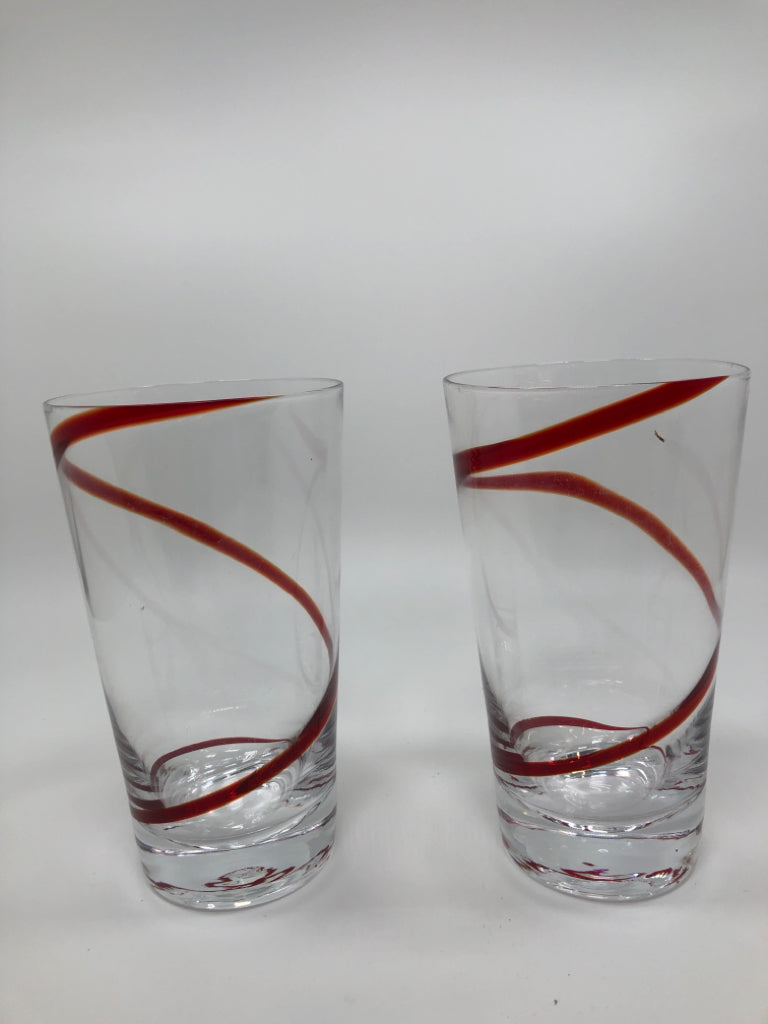 2 RED SWIRL GLASSES.