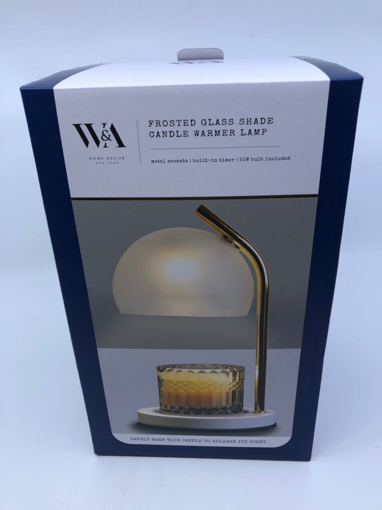 NIB CANDLE WARMER.