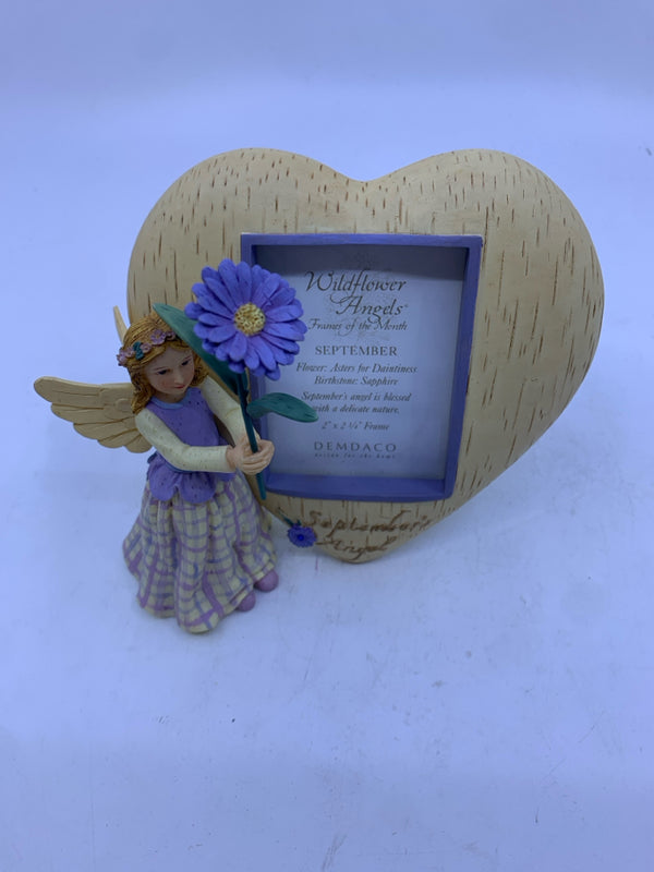 SEPTEMBER ANGEL W PURPLE FLORAL AND HEART FRAME.