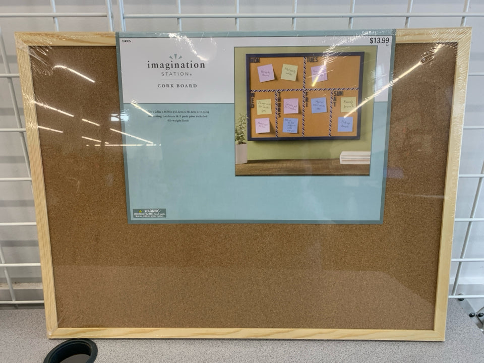 NIP FRAMED CORKBOARD.