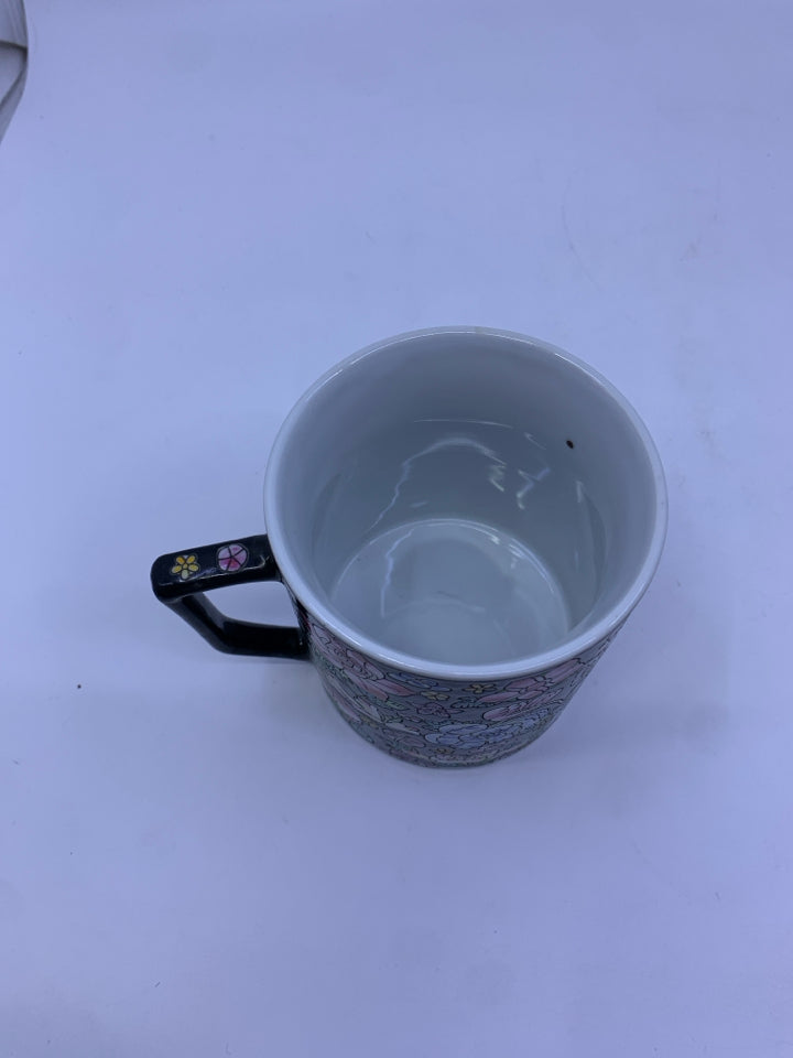 VTG BLACK W FLORAL ASIAN STYLE MUG.