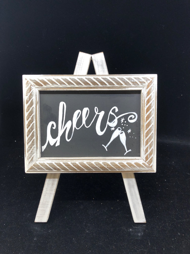 CHEERS-WHITE DISTRESSED CHALKBOARD SIGN ON EASEL.