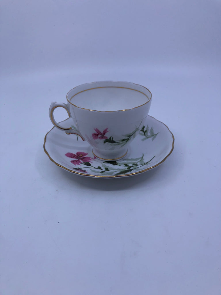 PINK FLORAL TEACUP AND SAUCER.